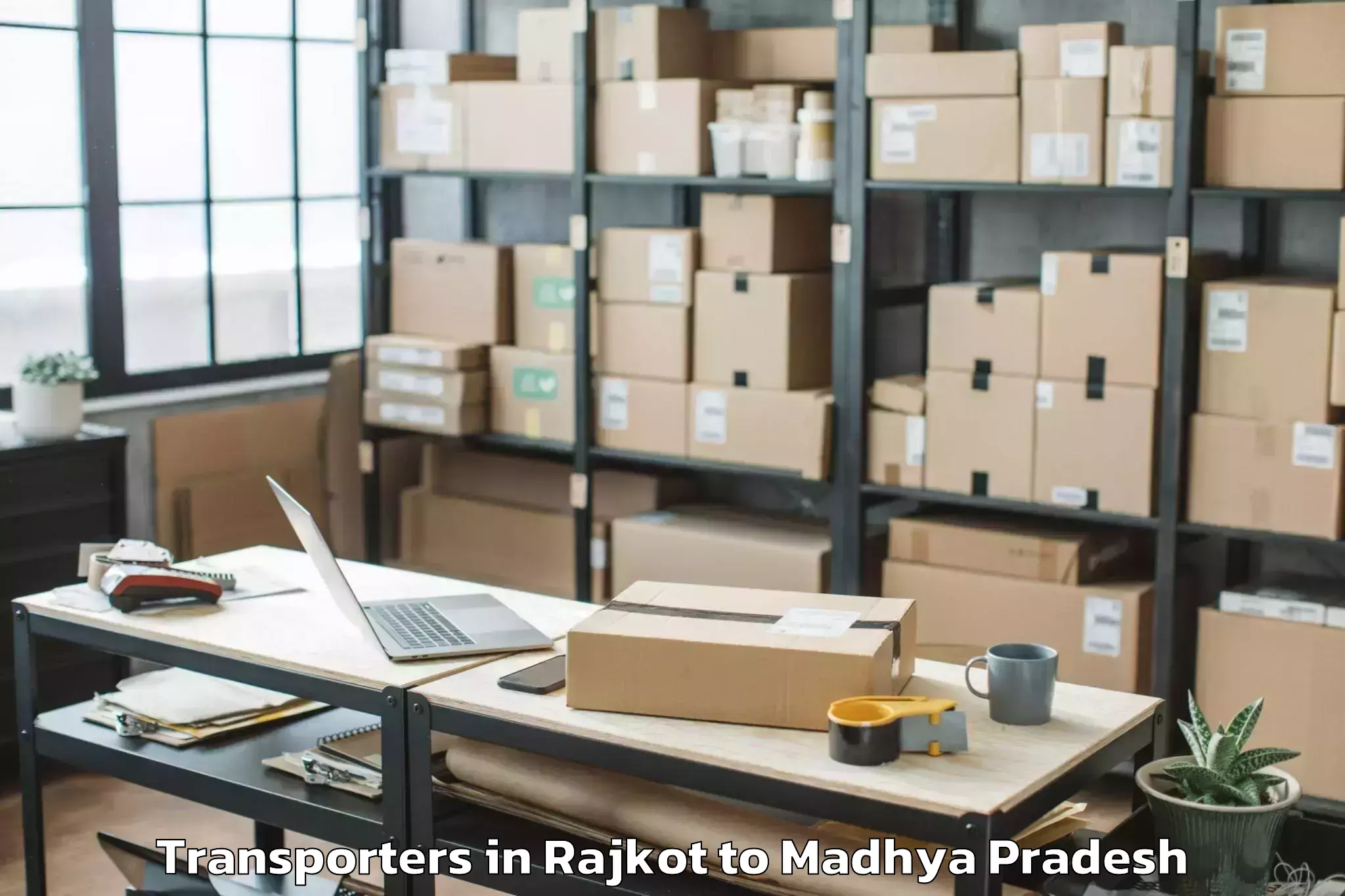 Book Rajkot to Sage University Indore Transporters Online